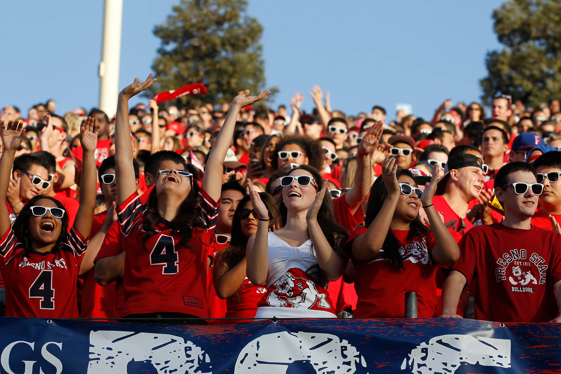 Fresno State students cheering at a football game