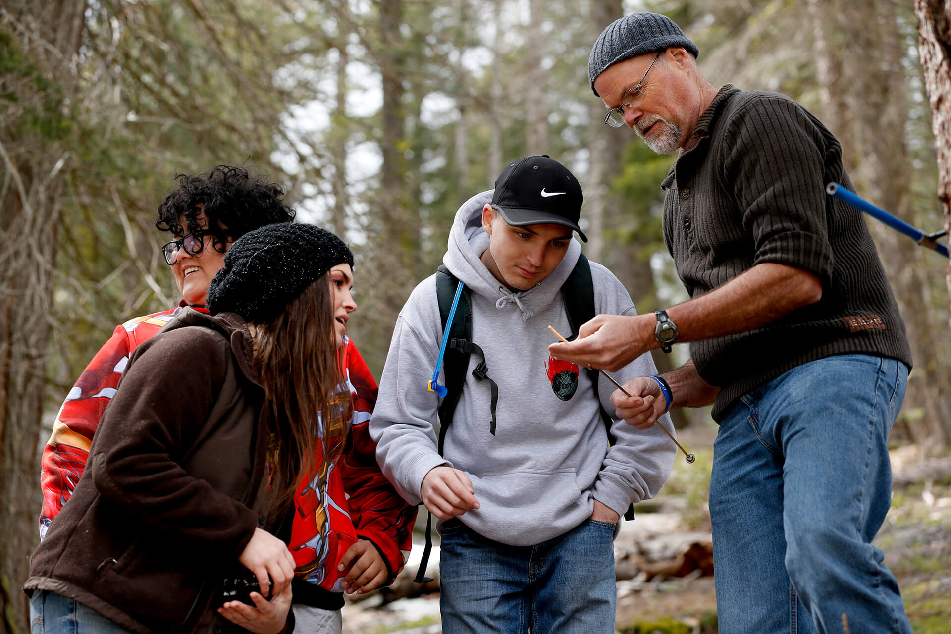 A Geology professor guiding students at Dinkey Creek