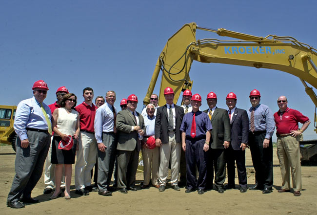Group Wearing Hard Hats at Construction Site