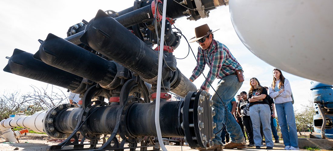 Students learning about irrigation